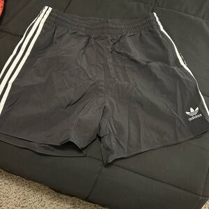 Adidas Black and White Athletic Shorts with Iconic Stripes